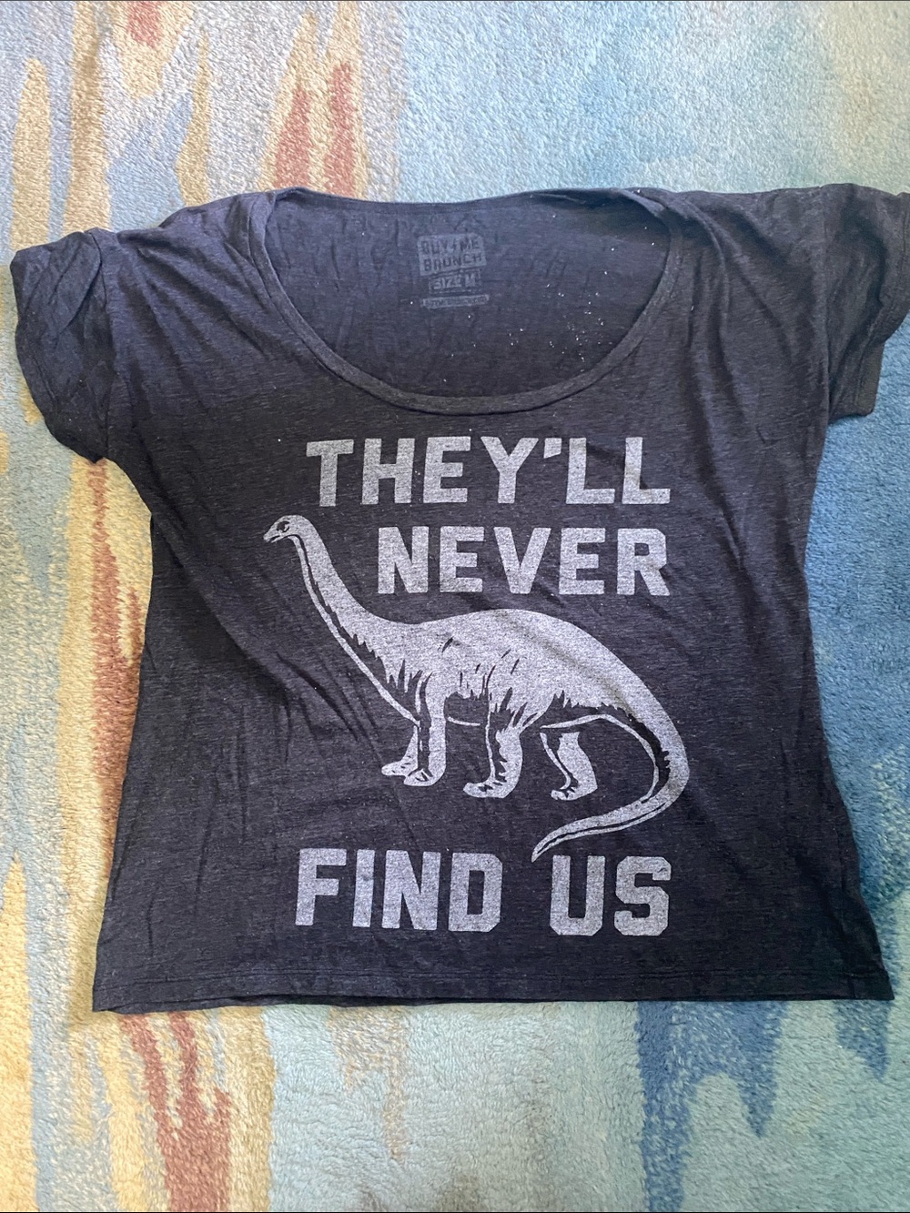 Women's Black Graphic Tee - 'They'll Never Find Us'